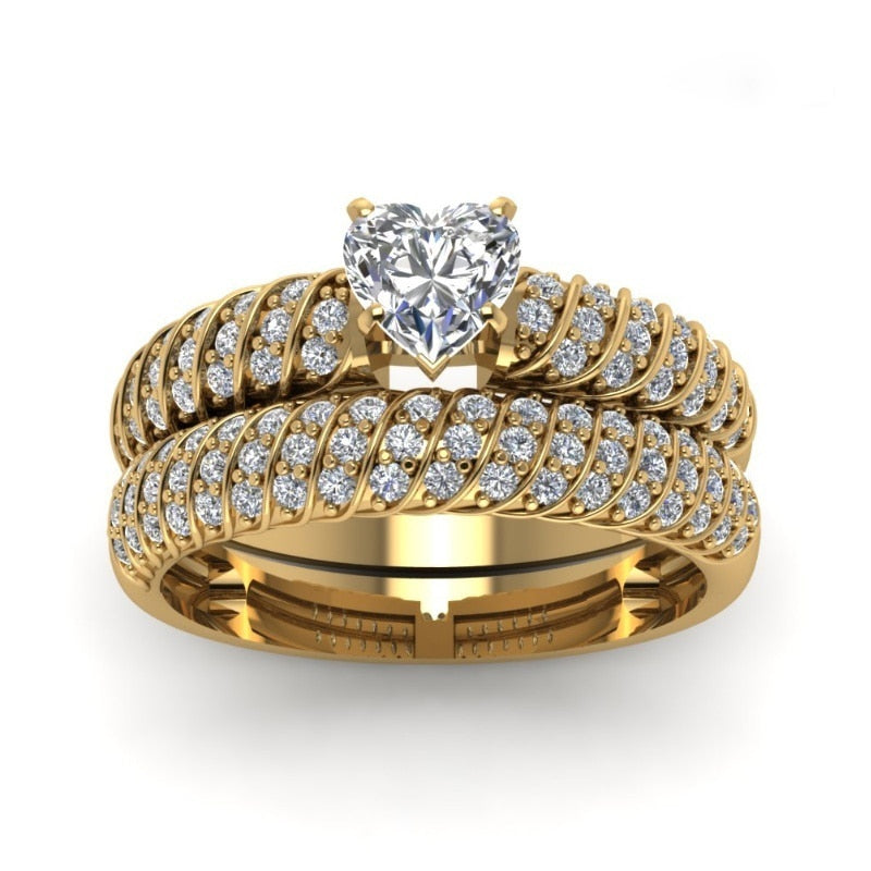 https://abaratona.com.br/collections/bijuterias/products/anel-de-cristal-banhado-a-ouro-e-prata-com-strass